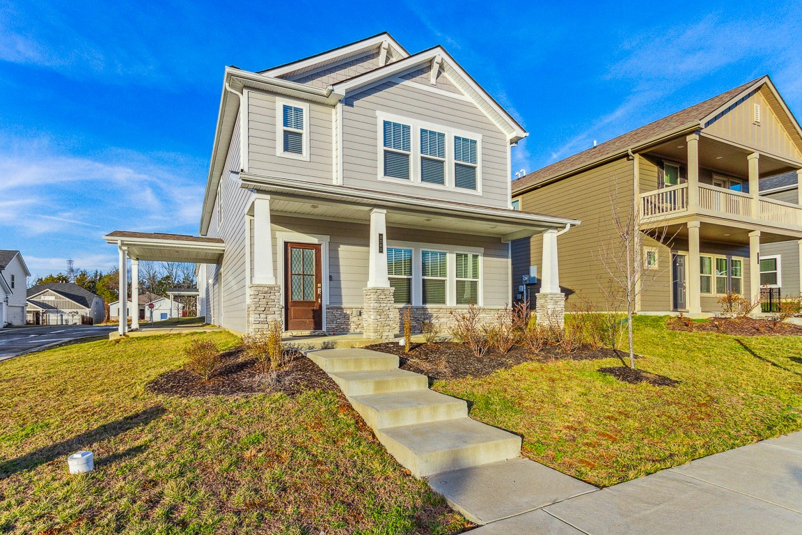 3261 Longstalk Road Antioch, TN 37013 - Photo 2 of 46 a front view of a house with swimming pool