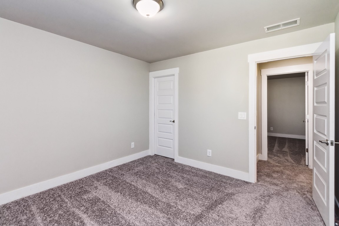 3261 Longstalk Road Antioch, TN 37013 - Photo 23 of 46 an empty room with a bench and a sink