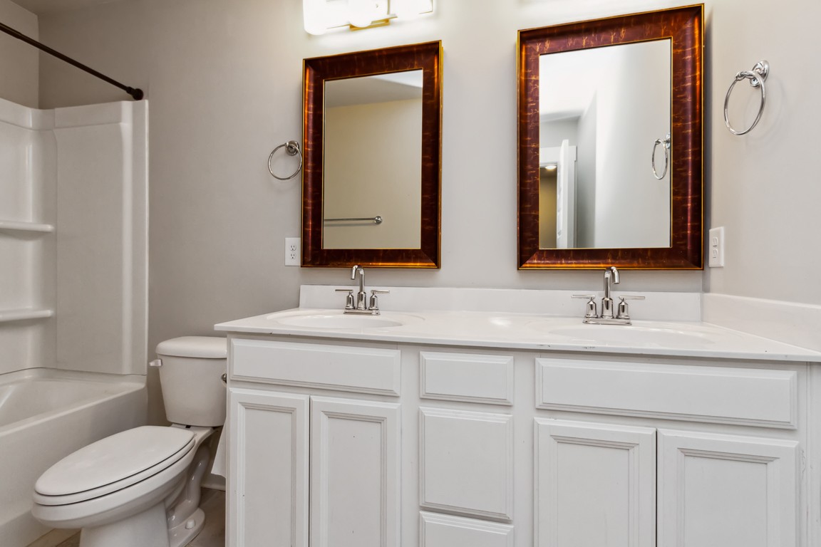 3261 Longstalk Road Antioch, TN 37013 - Photo 30 of 46 a bathroom with a toilet sink and mirror