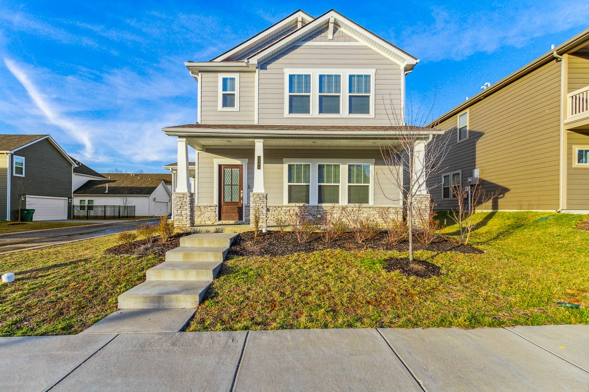 3261 Longstalk Road Antioch, TN 37013 - Photo 3 of 46 a front view of a house with a yard