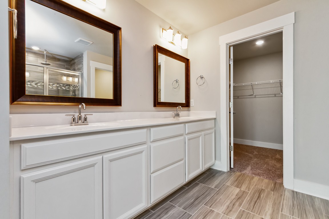 3261 Longstalk Road Antioch, TN 37013 - Photo 38 of 46 a en suite bathroom with 2 sink and a mirror