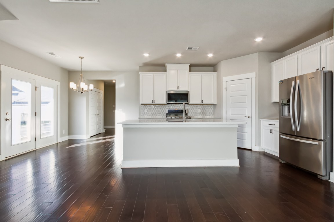 3261 Longstalk Road Antioch, TN 37013 - Photo 8 of 46 a view of kitchen with stainless steel appliances refrigerator oven and cabinets