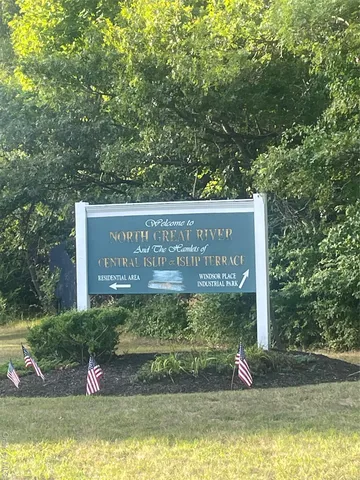 a view of swimming pool with a yard