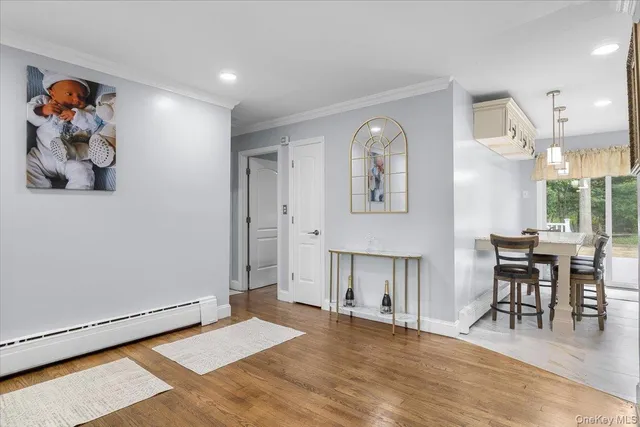 a view of a livingroom with furniture and window