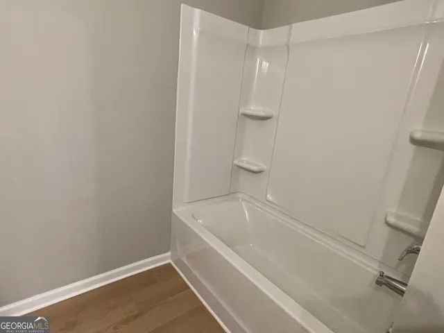 a bathroom with a bathtub