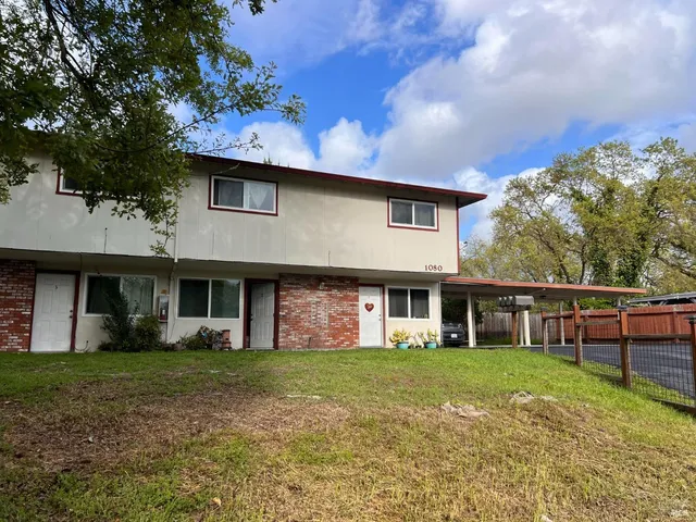 a front view of house with yard