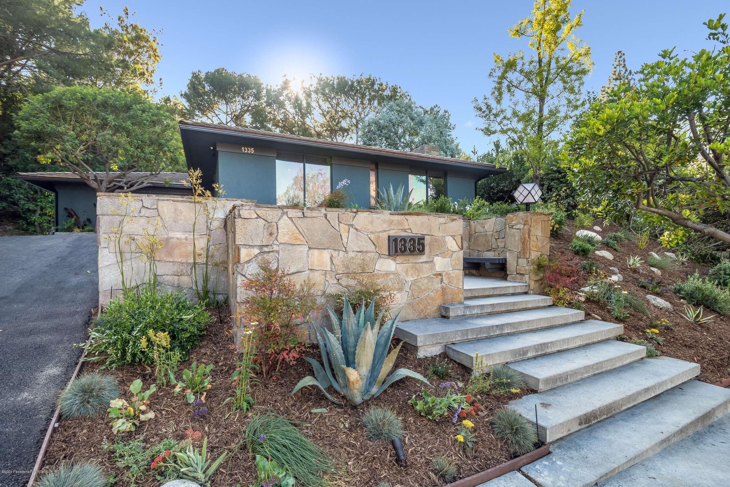 1335 Carnarvon Drive Pasadena, CA 91103 - Photo 1 of 52 a front view of a house with garden