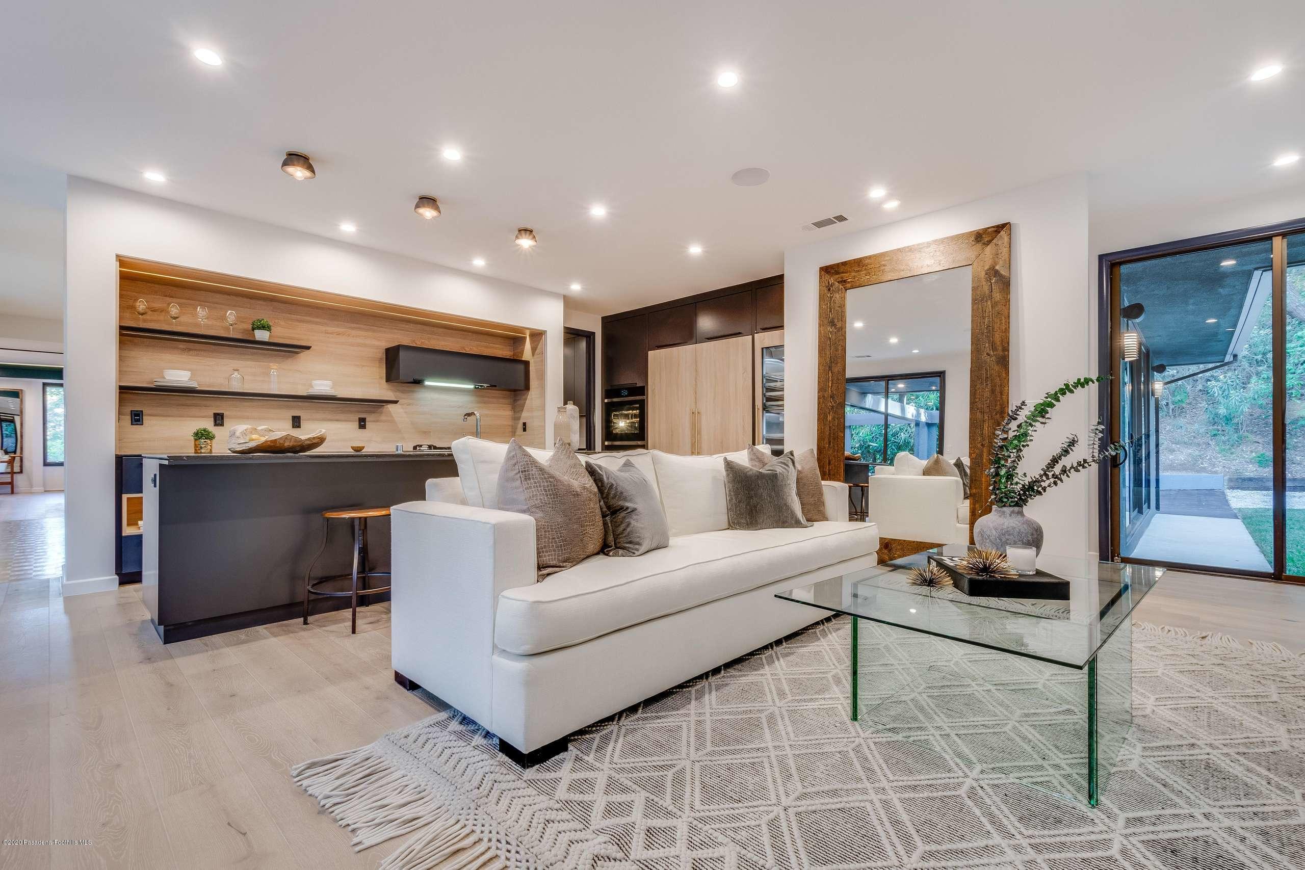 1335 Carnarvon Drive Pasadena, CA 91103 - Photo 16 of 52 a living room with furniture