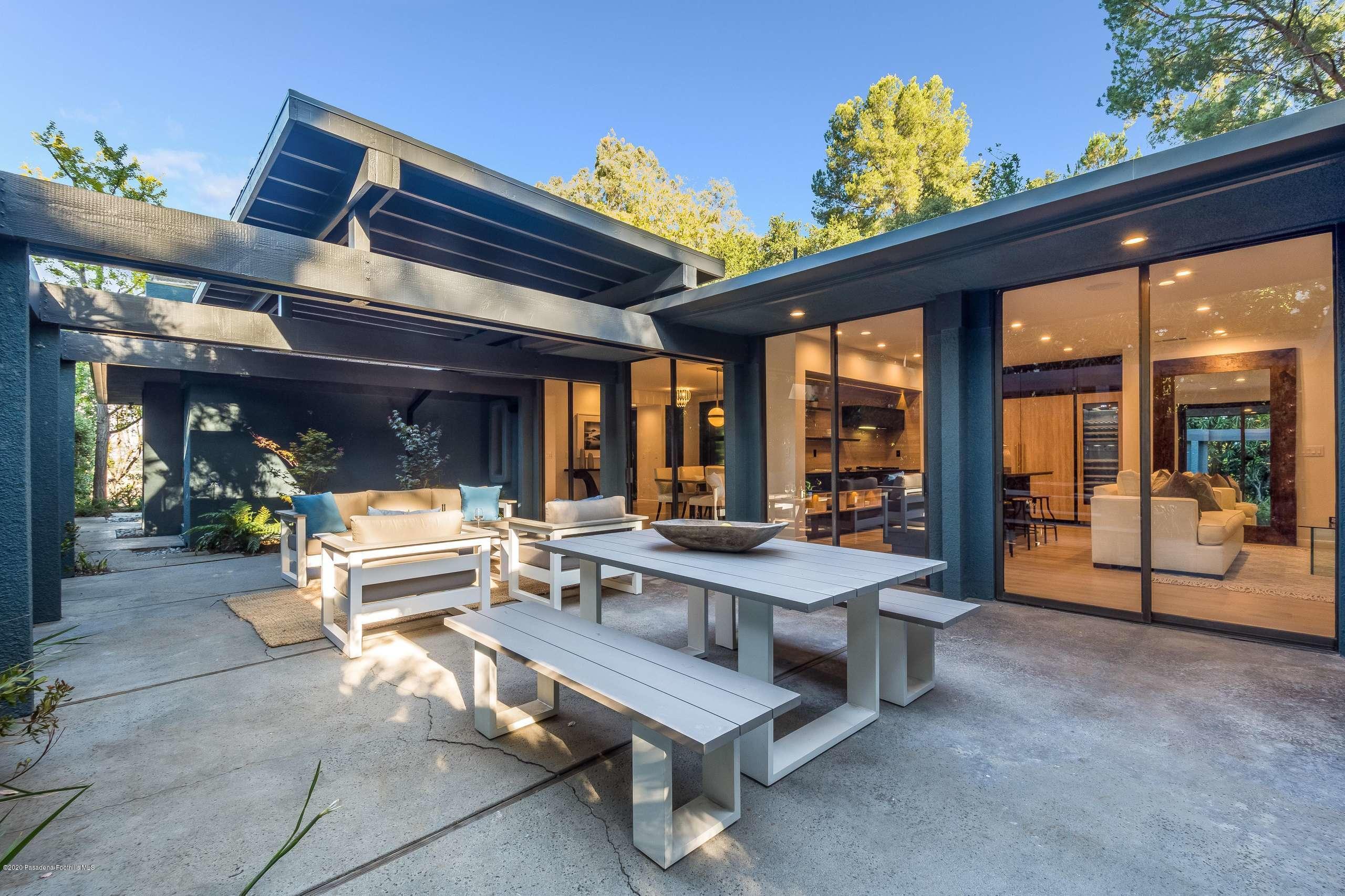 1335 Carnarvon Drive Pasadena, CA 91103 - Photo 25 of 52 a building outdoor space with patio furniture and potted plants