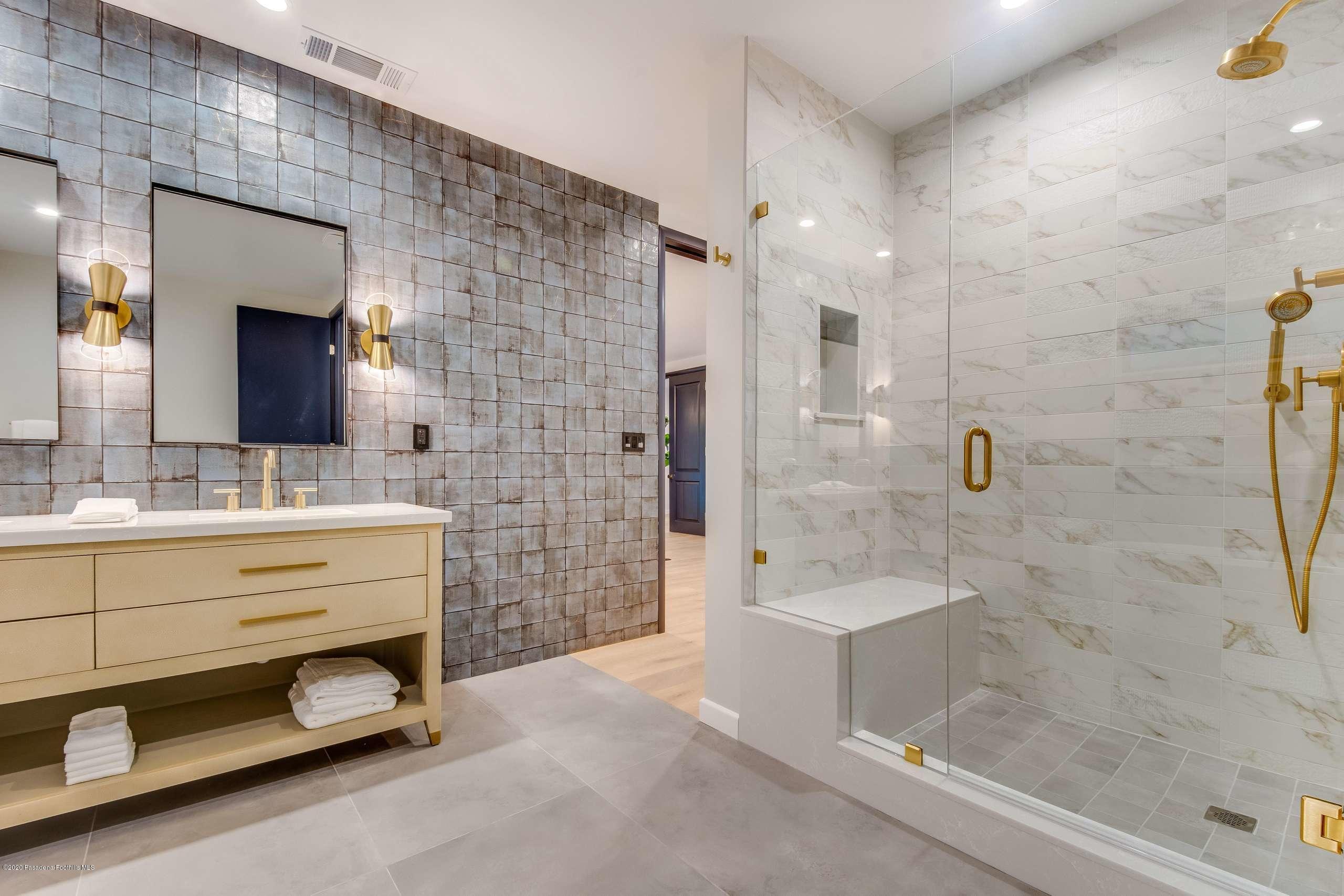 1335 Carnarvon Drive Pasadena, CA 91103 - Photo 30 of 52 a bathroom with a sink double vanity and a shower