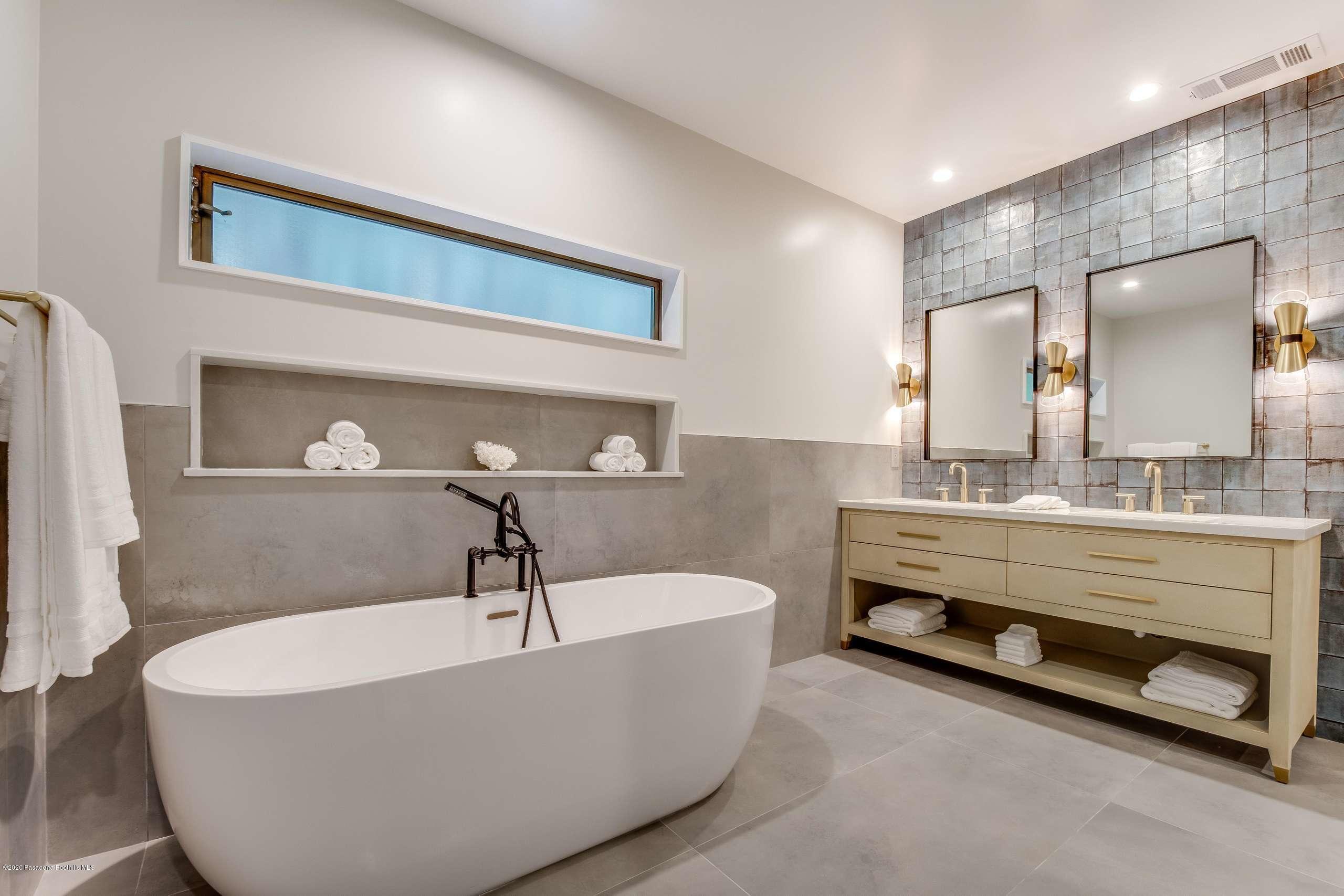 1335 Carnarvon Drive Pasadena, CA 91103 - Photo 31 of 52 a bathroom with a bathtub and a sink