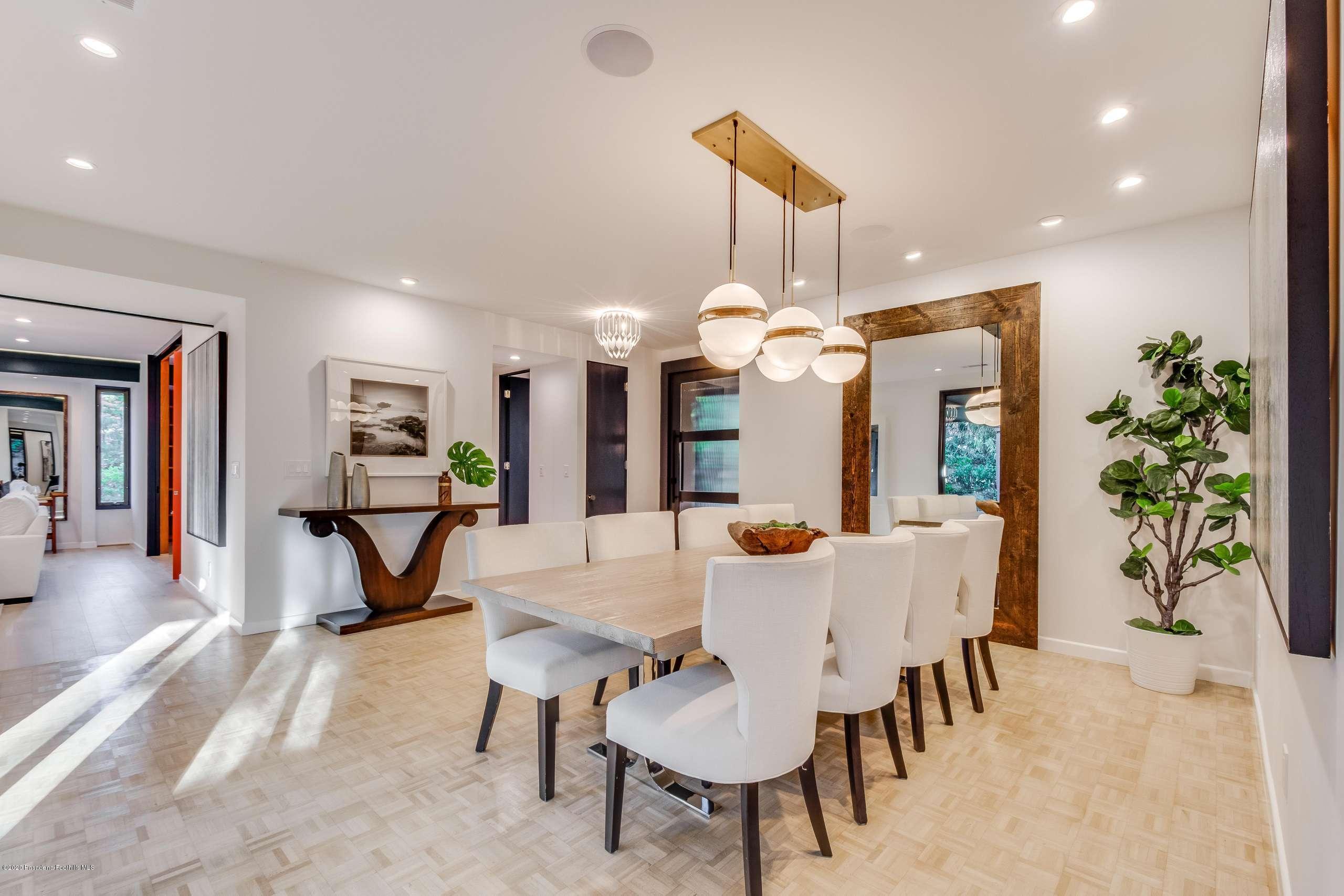 1335 Carnarvon Drive Pasadena, CA 91103 - Photo 6 of 52 a view of a dining room with furniture and chandelier