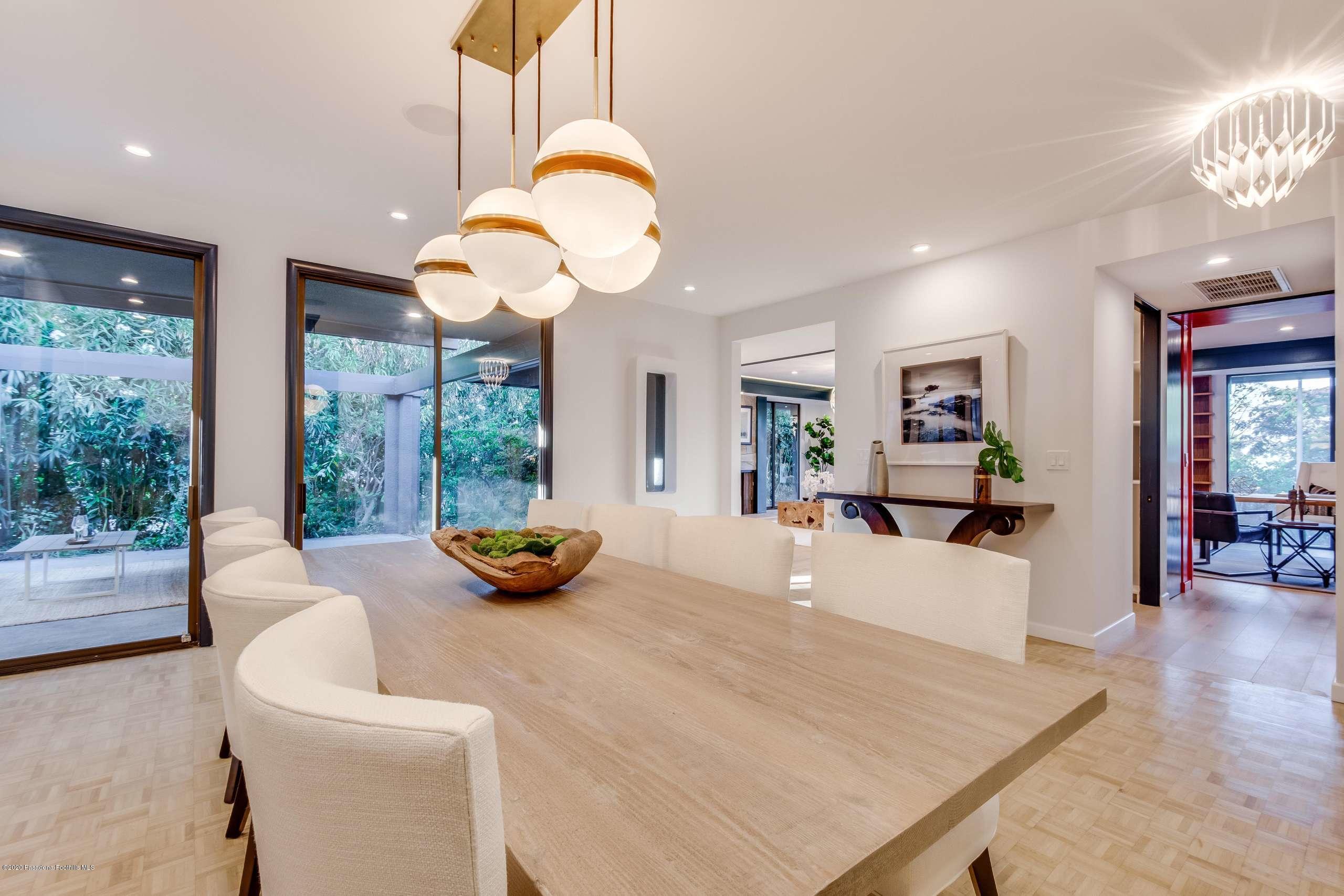 1335 Carnarvon Drive Pasadena, CA 91103 - Photo 7 of 52 a bedroom with furniture and a large window