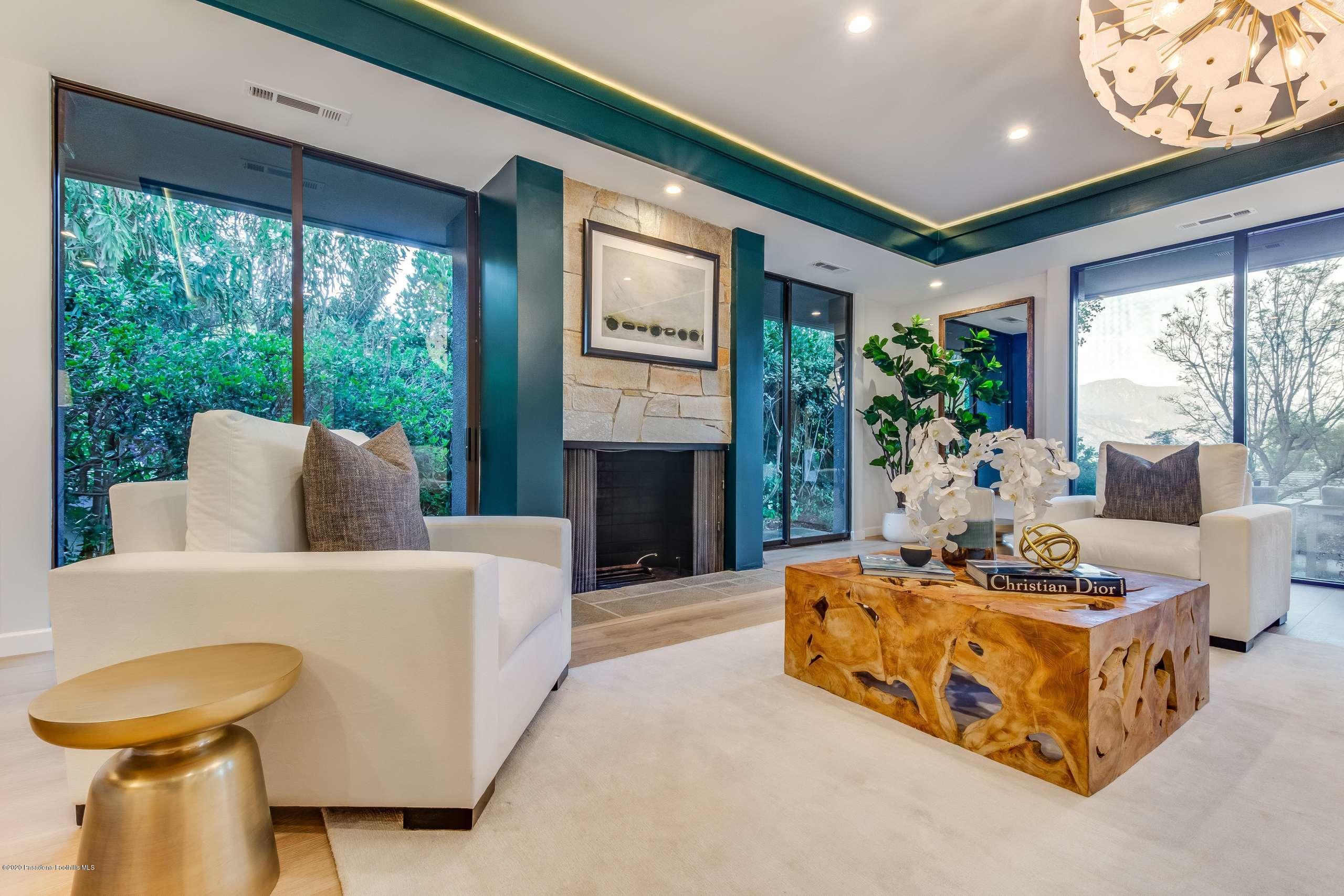 1335 Carnarvon Drive Pasadena, CA 91103 - Photo 9 of 52 a living room with furniture and a large window