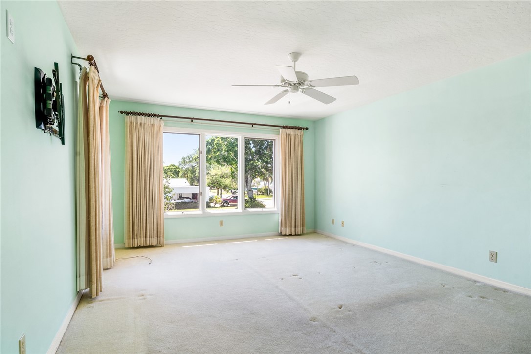 18 Tarpon Drive Vero Beach, FL 32960 - Photo 24 of 36 a view of room with window and ceiling fan