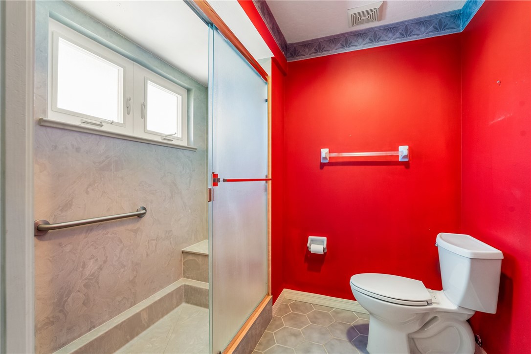 18 Tarpon Drive Vero Beach, FL 32960 - Photo 28 of 36 a bathroom with a toilet and a shower