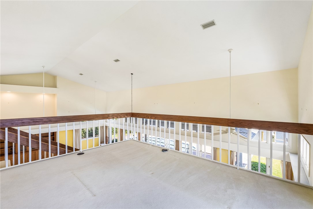 18 Tarpon Drive Vero Beach, FL 32960 - Photo 31 of 36 a view of an empty room with a staircase