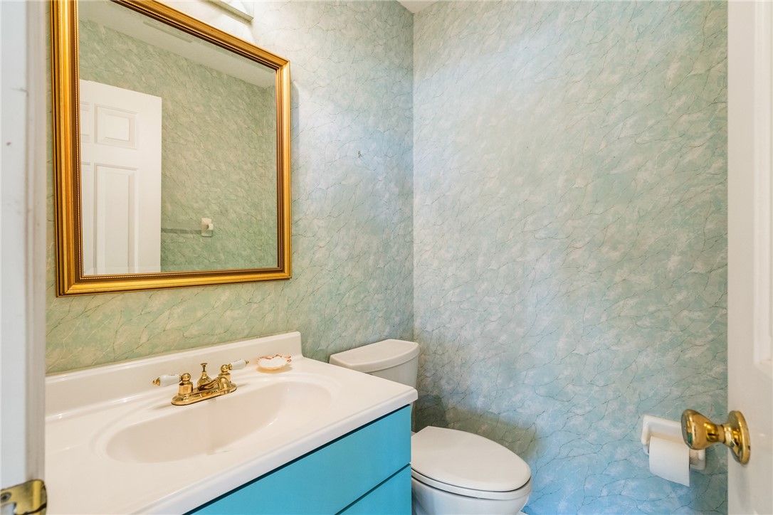 18 Tarpon Drive Vero Beach, FL 32960 - Photo 32 of 36 a bathroom with a sink a toilet and mirror