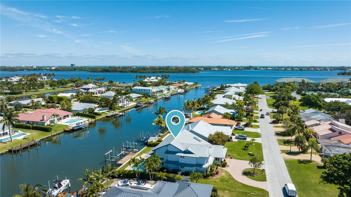 18 Tarpon Drive Vero Beach, FL 32960 - Photo 35 of 36 an aerial view of residential building and lake