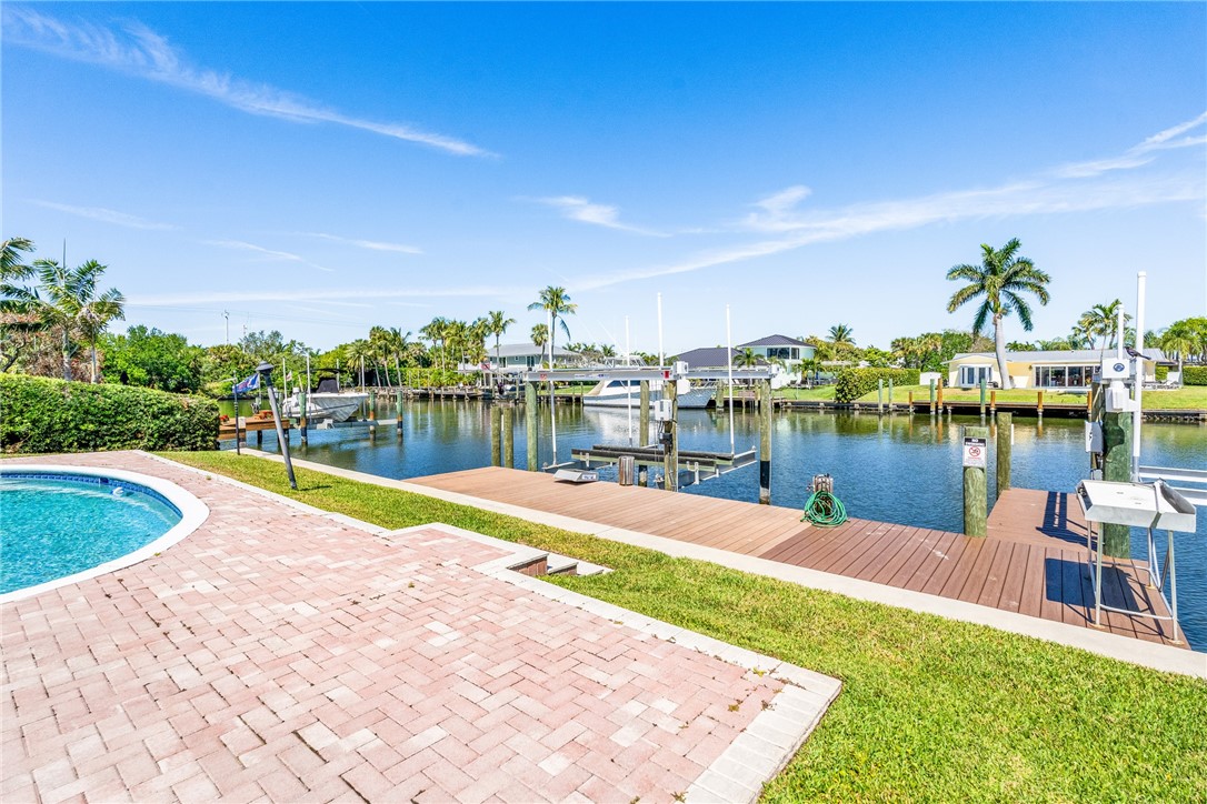 18 Tarpon Drive Vero Beach, FL 32960 - Photo 4 of 36 a view of a lake with house
