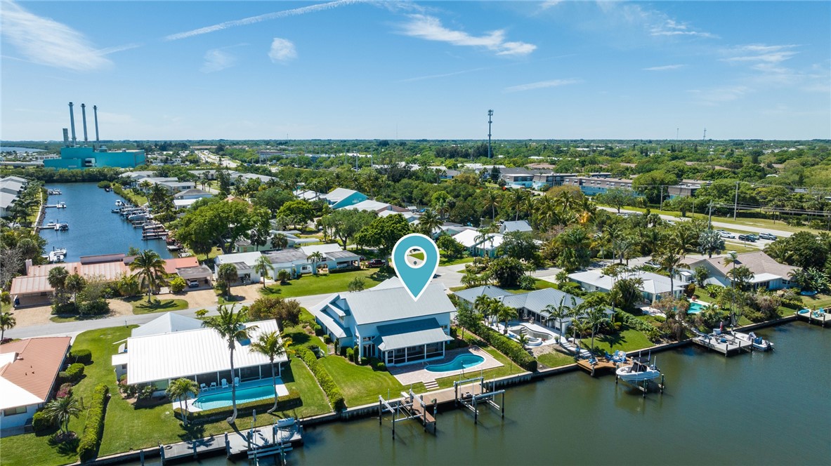 18 Tarpon Drive Vero Beach, FL 32960 - Photo 7 of 36 an aerial view of a house with a lake view