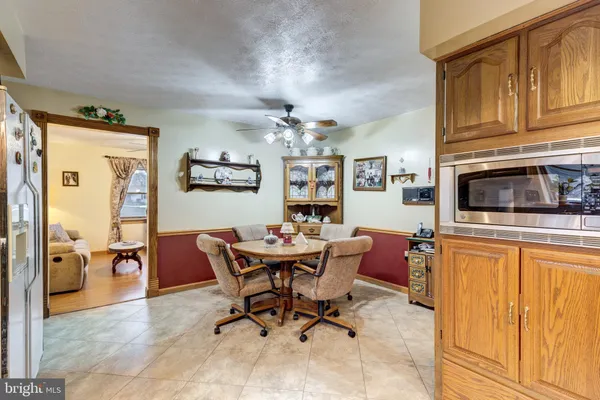 a view of a dining room with furniture