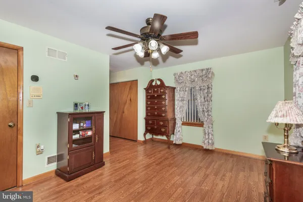 a view of a livingroom with a furniture