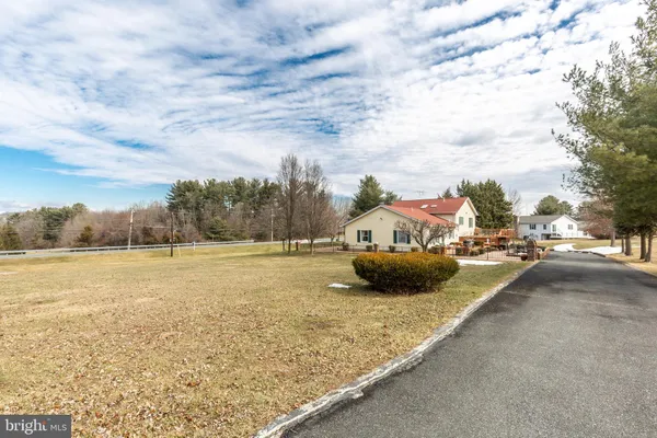a view of a terrace with furniture