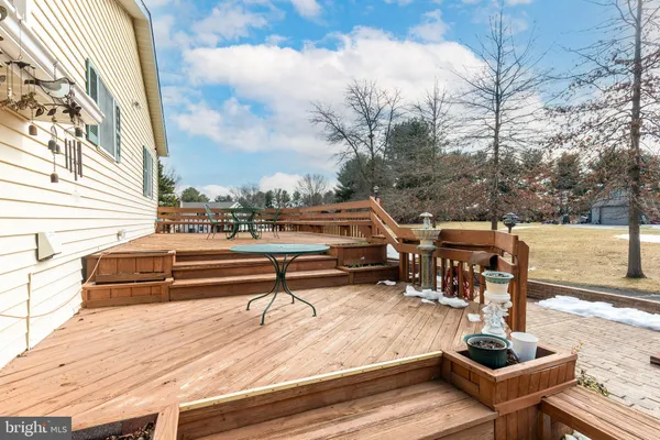 a house view with a swimming pool of the patio