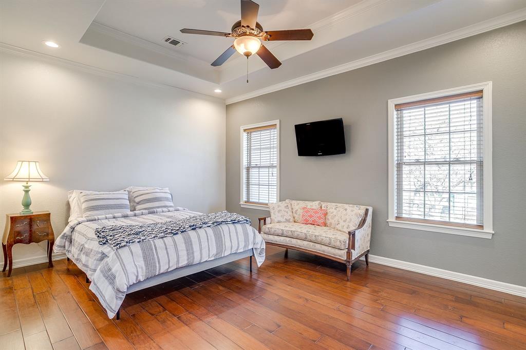 2608 Turkey Creek Road Mineral Wells, TX 76067 - Photo 24 of 39 a bedroom with a bed and a flat screen tv