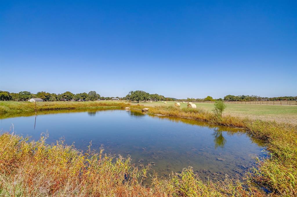 2608 Turkey Creek Road Mineral Wells, TX 76067 - Photo 3 of 39 a view of a lake with outside of house