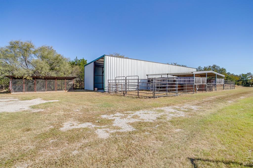 2608 Turkey Creek Road Mineral Wells, TX 76067 - Photo 36 of 39 a view of swimming pool with outdoor seating and house in the background