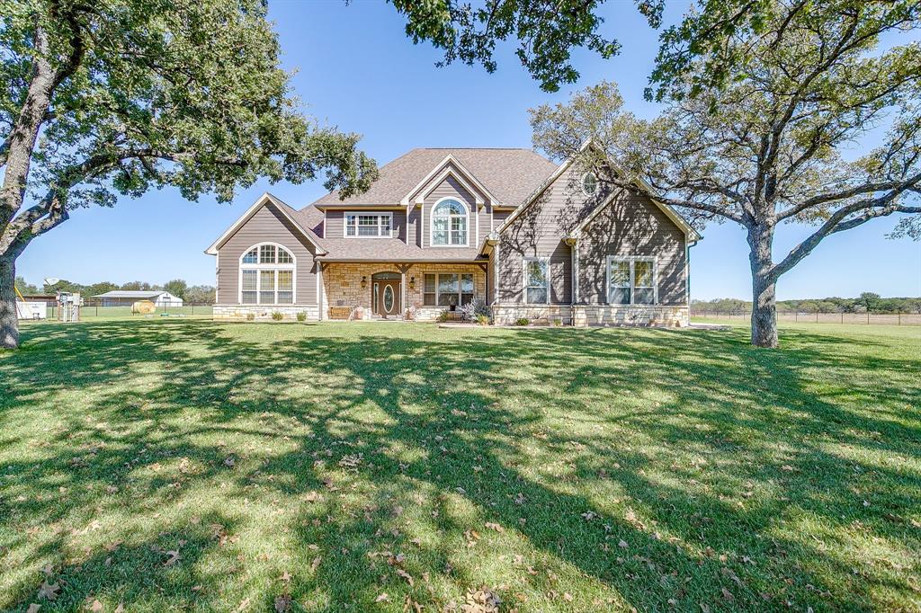 2608 Turkey Creek Road Mineral Wells, TX 76067 - Photo 5 of 39 a front view of house with yard and green space