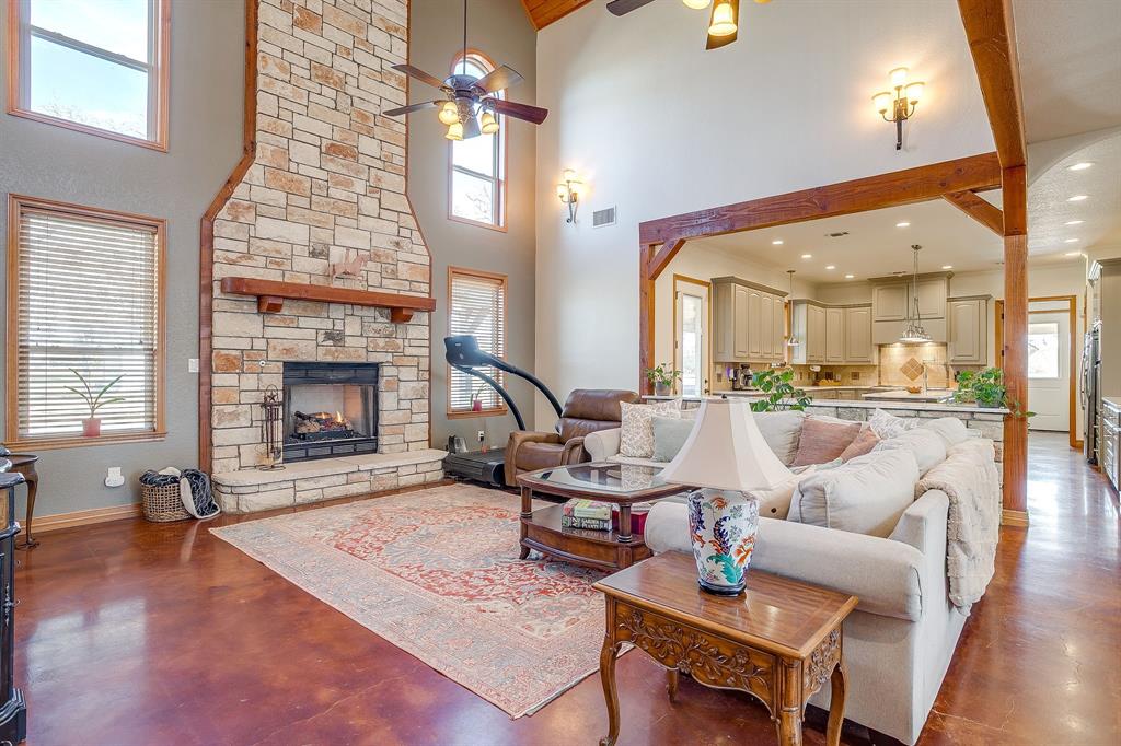 2608 Turkey Creek Road Mineral Wells, TX 76067 - Photo 8 of 39 a living room with furniture and a fireplace