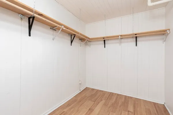 a view of a room with racks on the wall