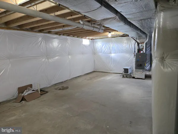 a view of a room with wooden walls