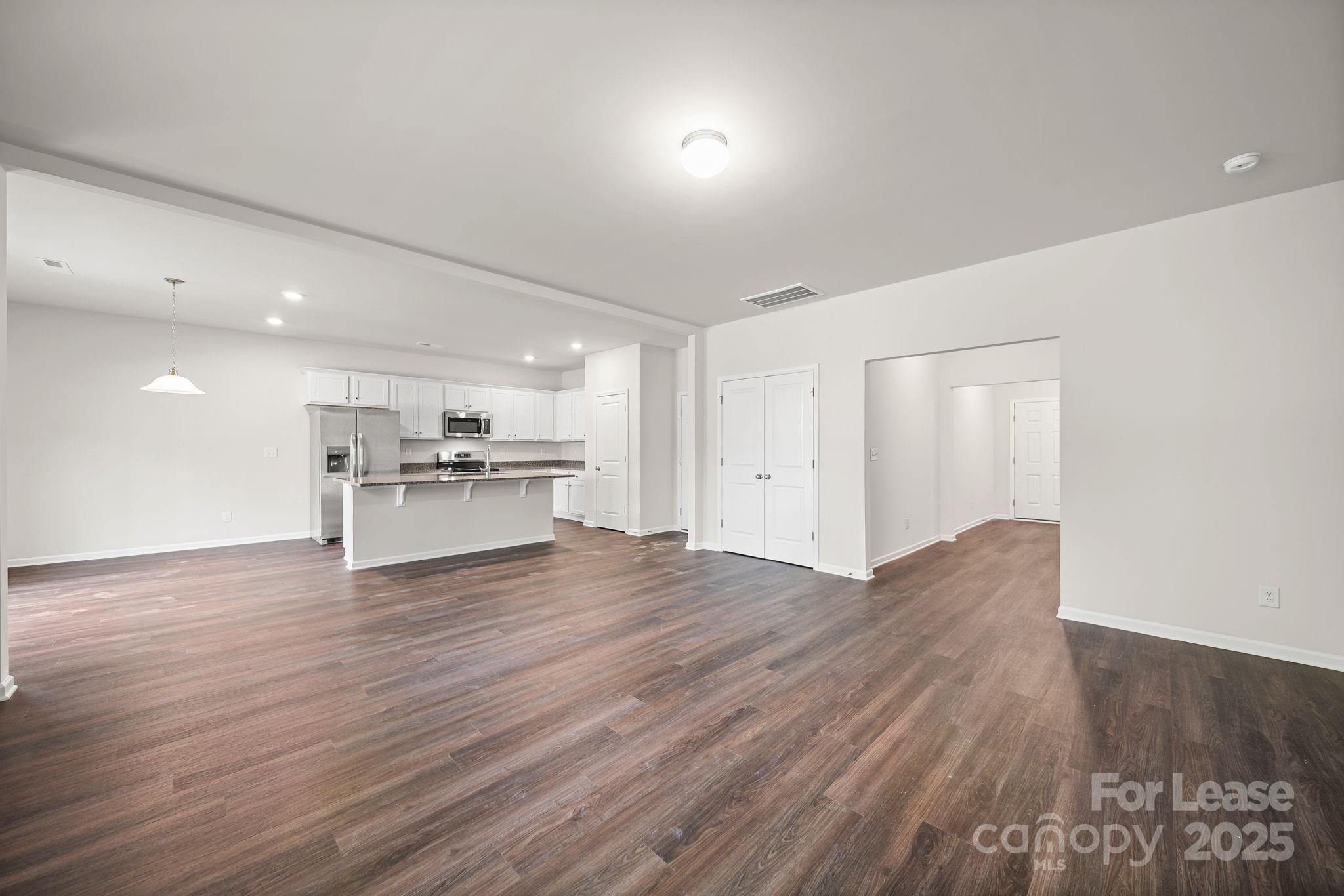 3200 Polk And White Road, Unit A Charlotte, NC 28269 - Photo 23 of 35 a view of kitchen with wooden floor