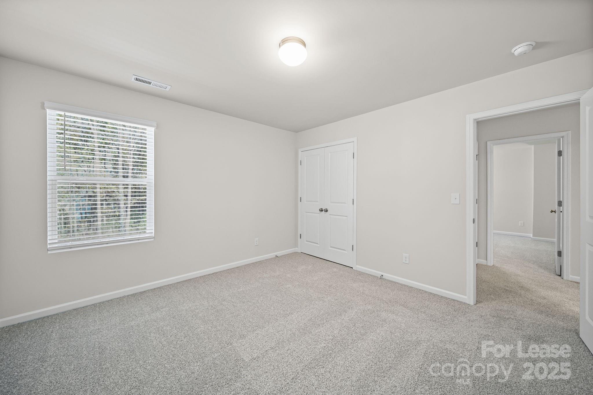 3200 Polk And White Road, Unit A Charlotte, NC 28269 - Photo 34 of 35 an empty room with a window