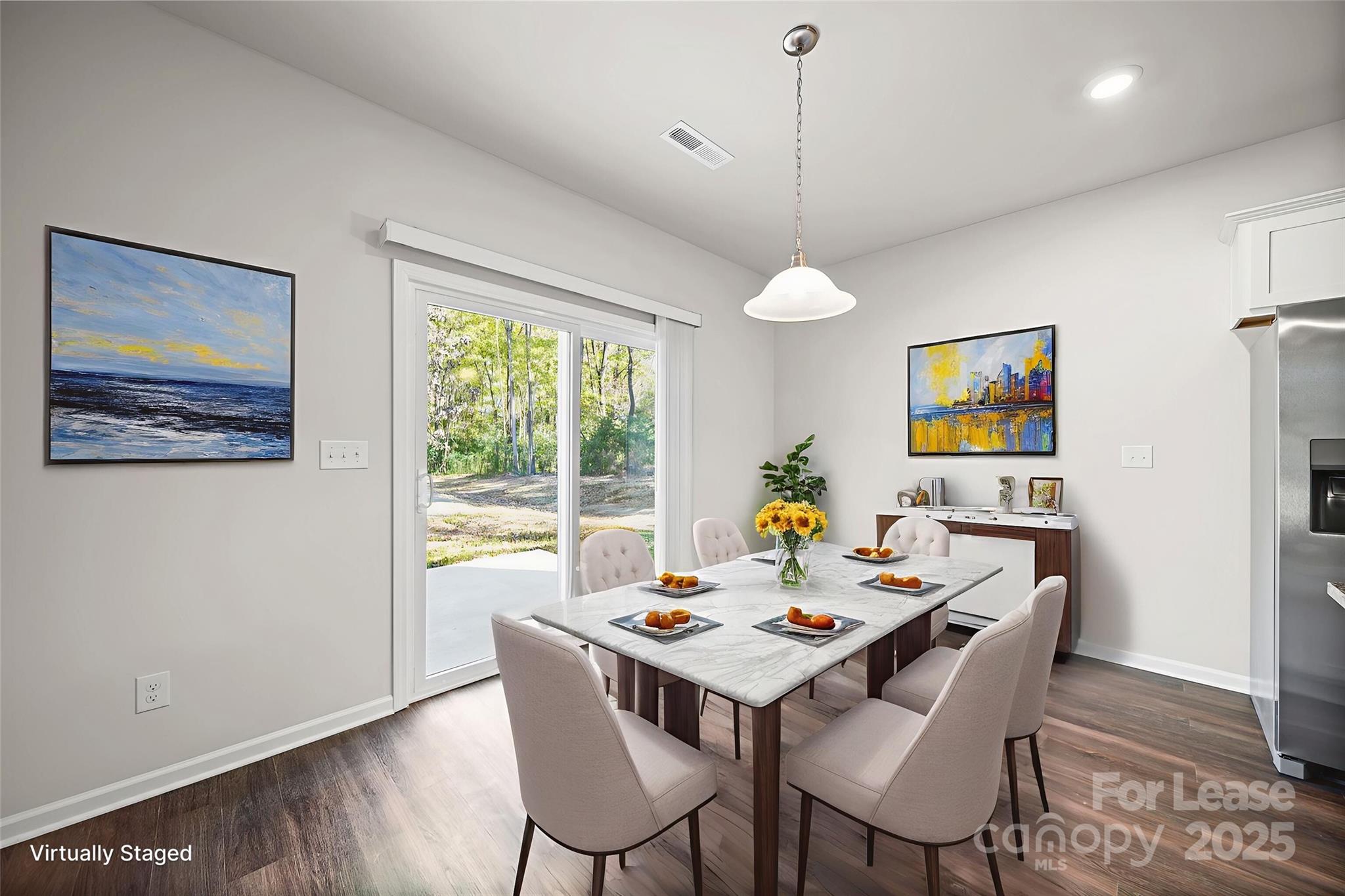 3200 Polk And White Road, Unit A Charlotte, NC 28269 - Photo 7 of 35 a view of a dining room with a table and chairs
