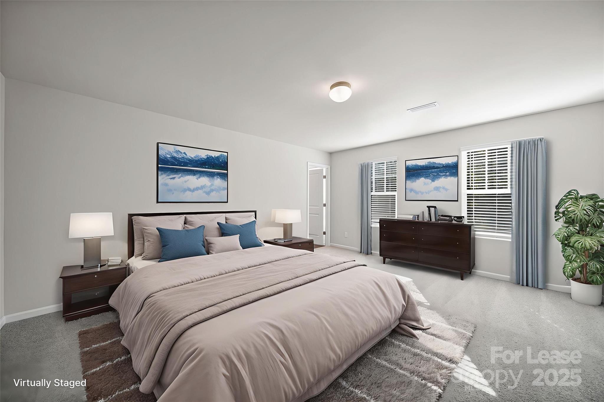 3200 Polk And White Road, Unit A Charlotte, NC 28269 - Photo 9 of 35 a spacious bedroom with a bed and a couch