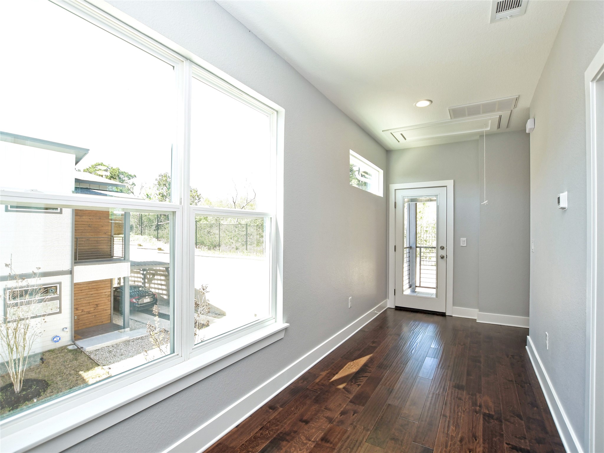 1130 Lott Avenue, Unit B Austin, TX 78721 - Photo 14 of 29 Entryway with hardwood / wood-style flooring and recessed lighting