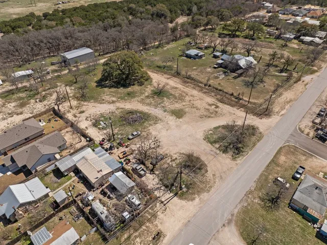 an aerial view of residential house with outdoor space