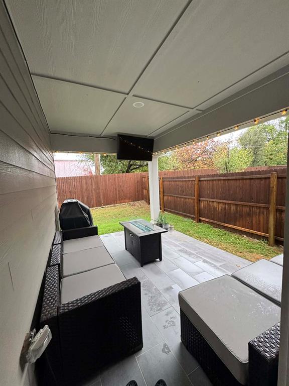 8628 Spindletop Drive Fort Worth, TX 76120 - Photo 20 of 21 a view of yard with patio