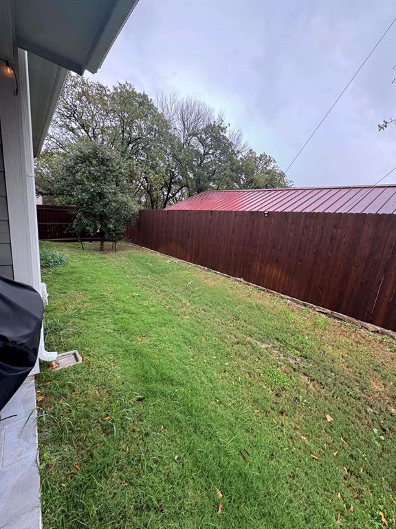 8628 Spindletop Drive Fort Worth, TX 76120 - Photo 21 of 21 a view of backyard with green space