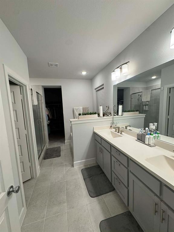 8628 Spindletop Drive Fort Worth, TX 76120 - Photo 8 of 21 a view of a kitchen with refrigerator and windows