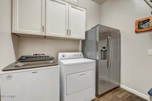 a view of a house with patio and swimming pool