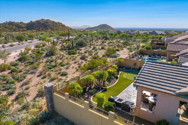 an aerial view of residential building with outdoor space