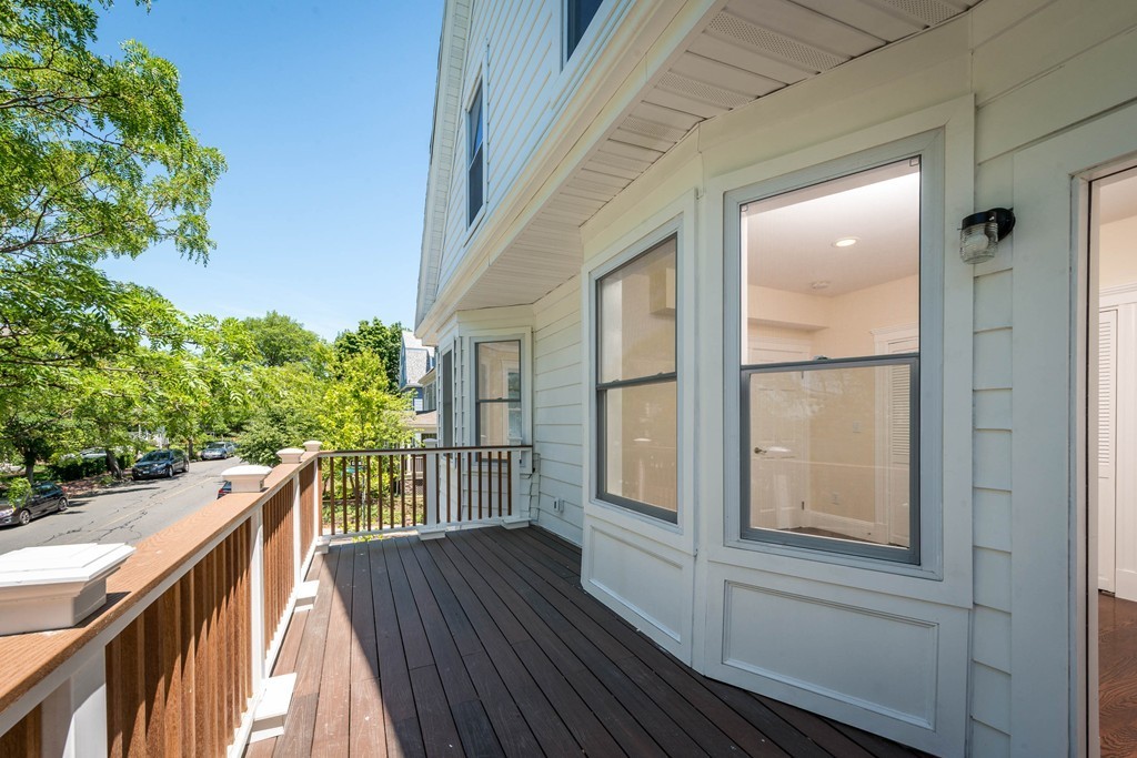 180 Magazine Street, Unit 2 Cambridge, MA 02139 - Photo 14 of 20 a view of balcony with wooden floor