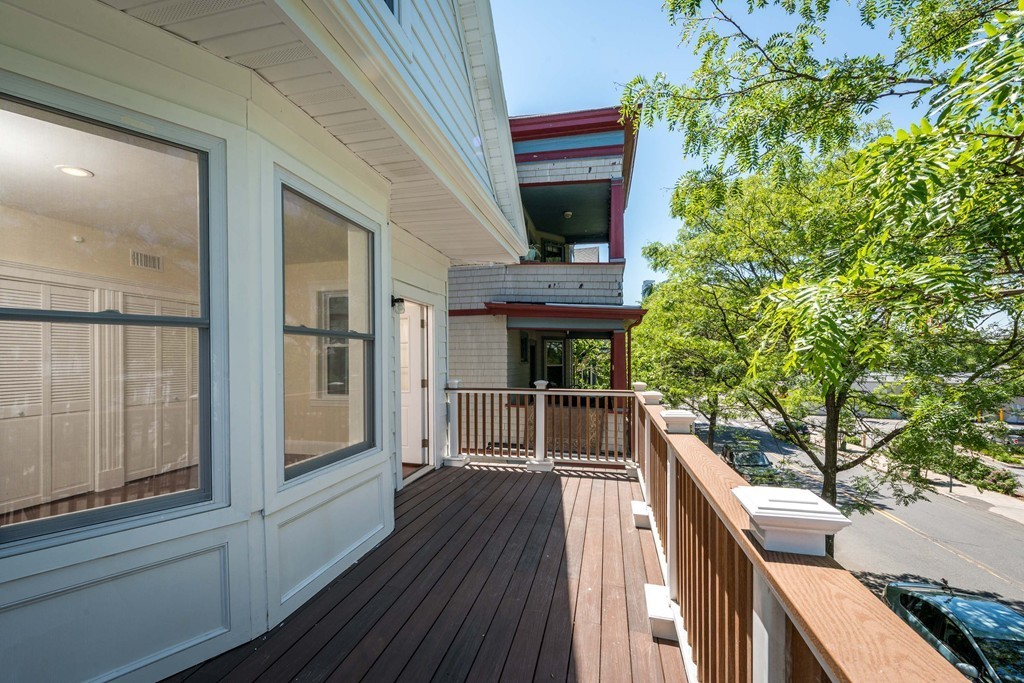 180 Magazine Street, Unit 2 Cambridge, MA 02139 - Photo 15 of 20 a view of an entryway with wooden floor and fence