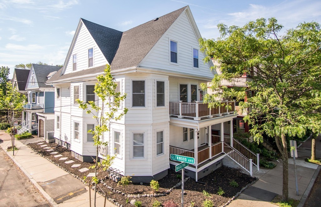 180 Magazine Street, Unit 2 Cambridge, MA 02139 - Photo 19 of 20 a front view of a house with a garden